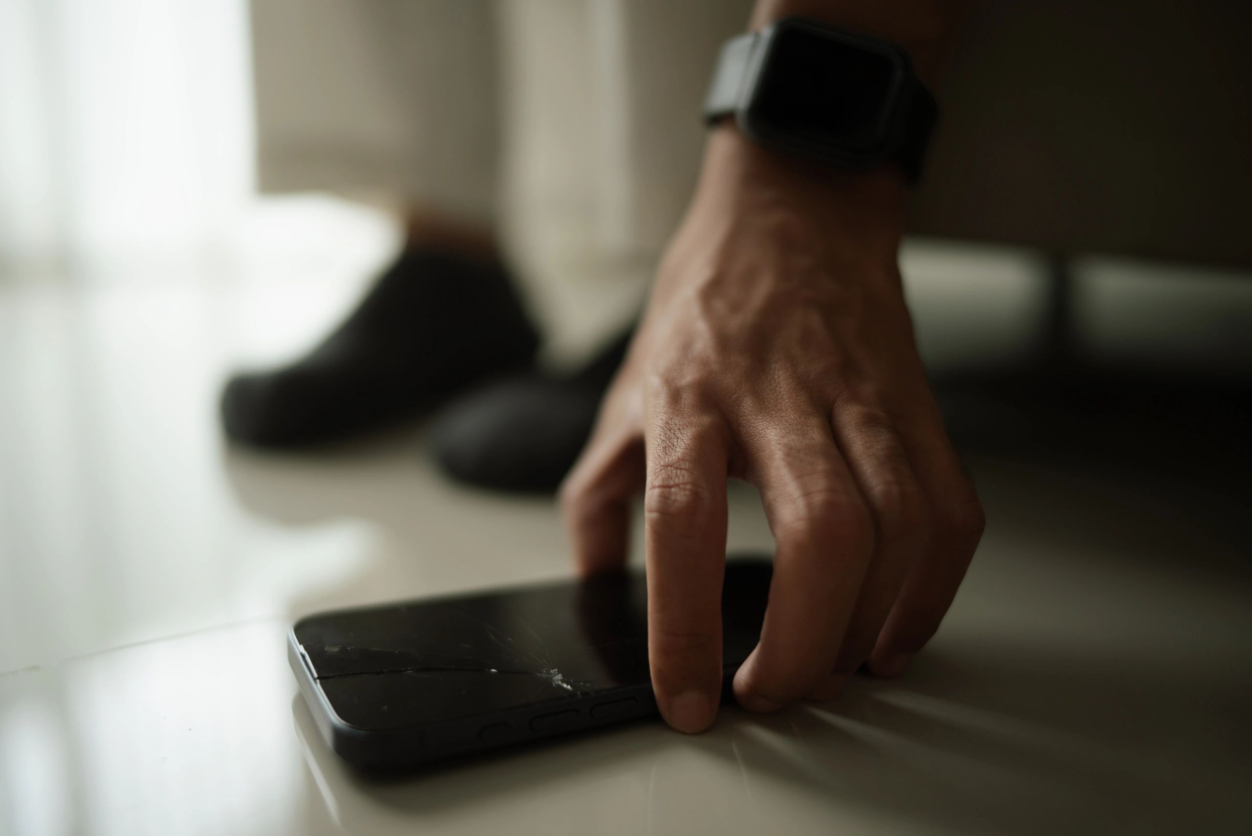 Close-up of a smartphone after being dropped